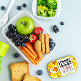 Freshé BPA-free tin packaging, travel-friendly.