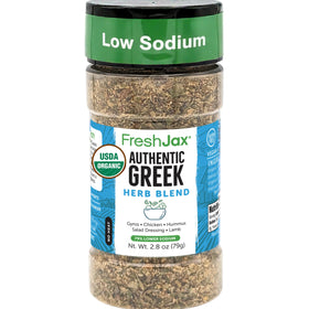 FreshJax Greek Seasoning bottle pouring for bold, low-sodium flavor.