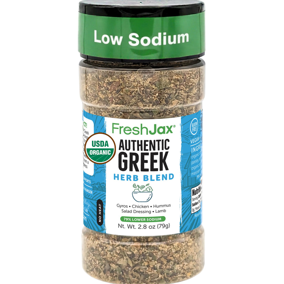 FreshJax Greek Seasoning bottle pouring for bold, low-sodium flavor.