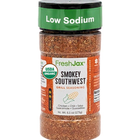 FreshJax Smokey Southwest seasoning bottle close-up for bold outdoor grilling flavor.