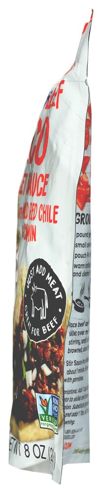 Frontera Original Taco Skillet Sauce being poured into a hot skillet.