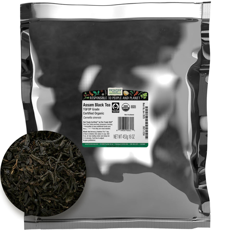 Frontier Co-op Assam tea leaf close-up showing rich aroma and premium quality.