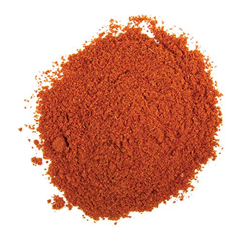 Frontier Co-op Organic Cayenne powder bottle close-up showing fiery heat for bold dishes.