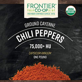 Frontier Co-op cayenne powder packaging on a shelf highlighting organic and kosher certification.