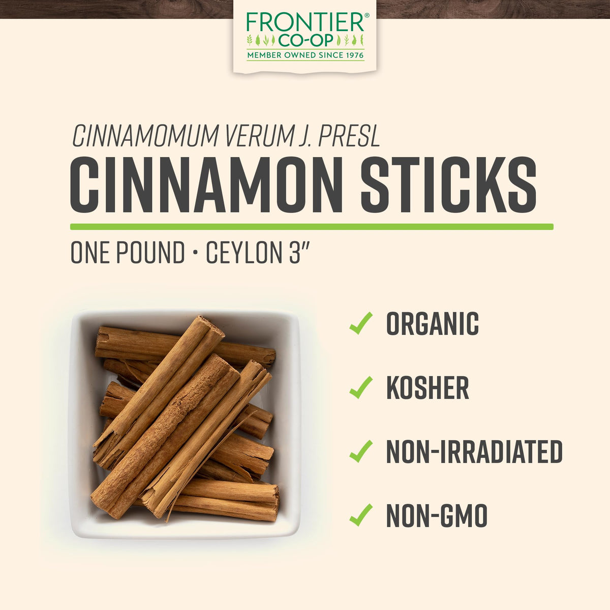 Frontier Co-op Ceylon cinnamon sticks beside tea, ideal for fragrant infusions.