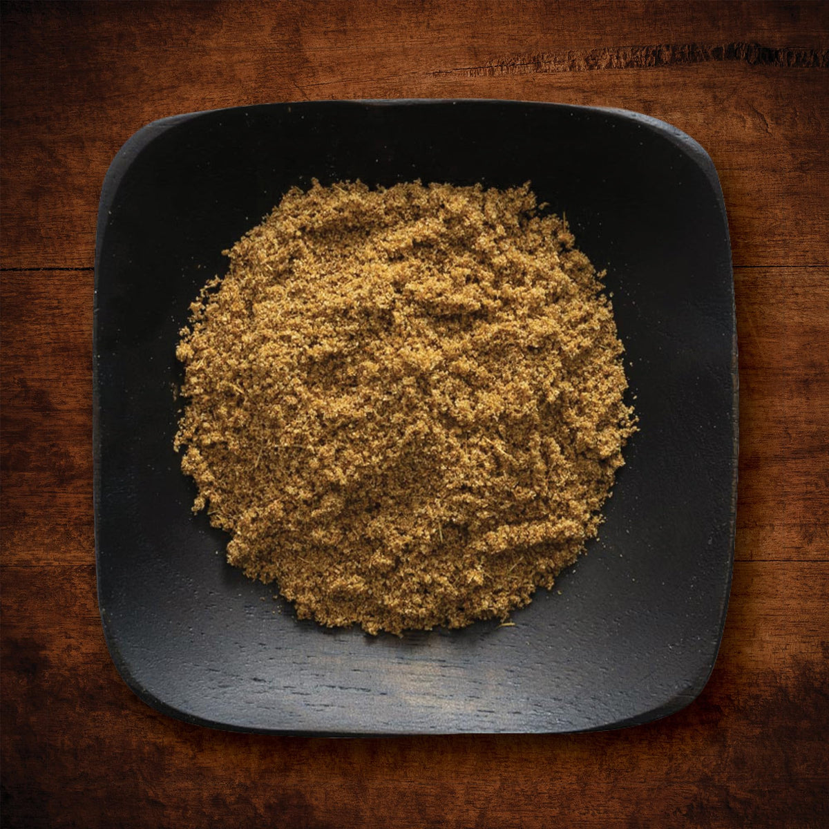 Frontier Co-op Ground Cumin Powder in a resealable jar for easy dispensing.