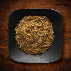 Frontier Co-op Ground Cumin Powder in a resealable jar for easy dispensing.