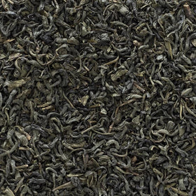 Frontier Co-op Jasmine Green Tea pour demonstrating a low-caffeine option for evenings