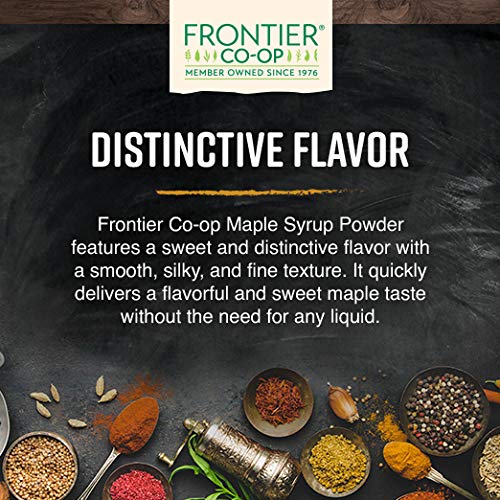 Frontier Co-op maple syrup powder melting into hot cocoa for cozy drinks.