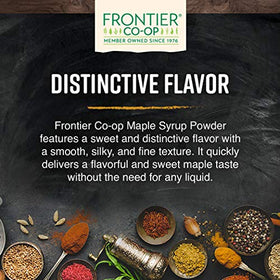 Frontier Co-op maple syrup powder melting into hot cocoa for cozy drinks.