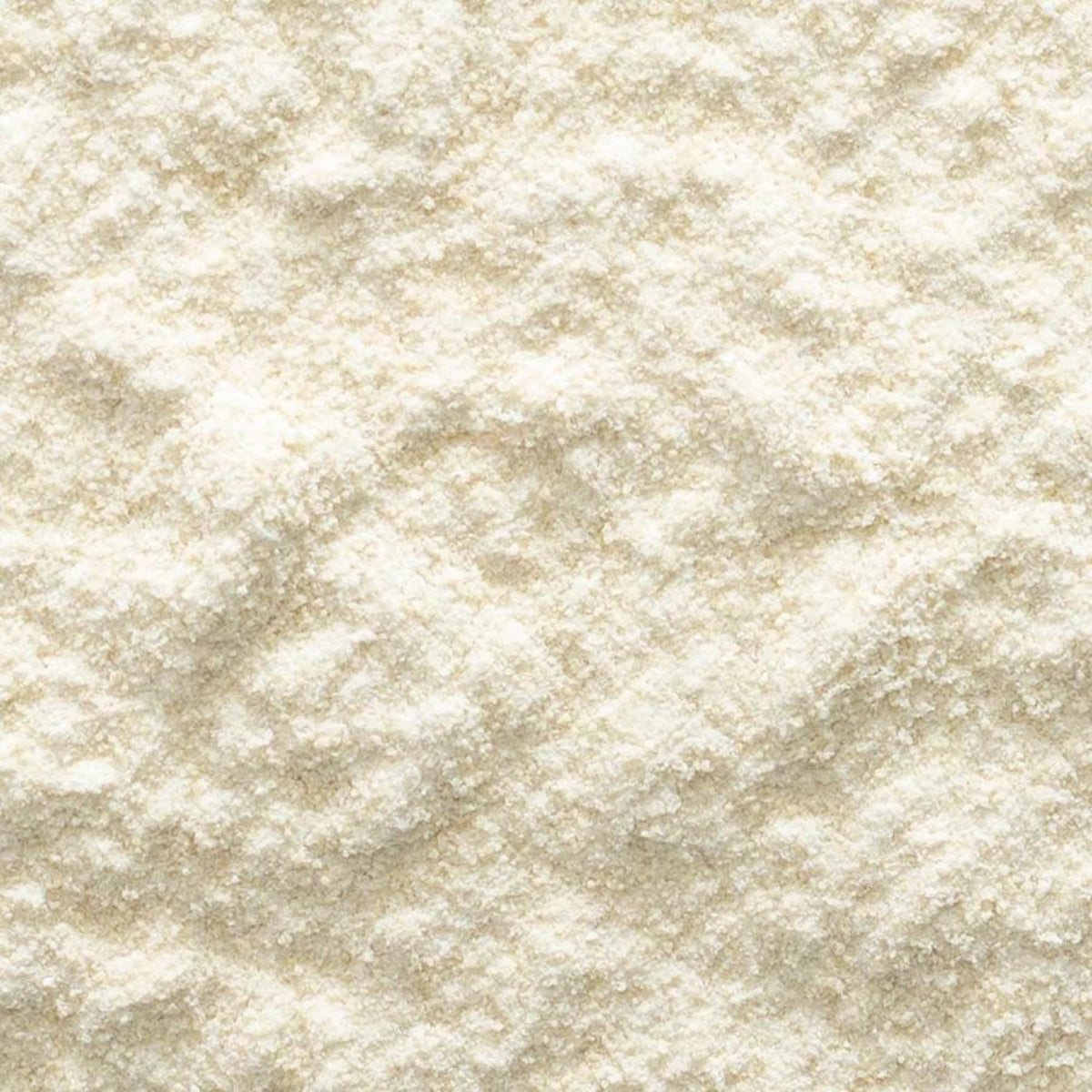 Frontier Co-op maple syrup powder dissolving in hot tea for a fragrant sip.