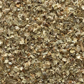 Frontier Co-op marjoram leaf being sprinkled into a pan for flavor.