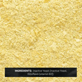 Frontier Co-op Nutritional Yeast Mini Flakes sprinkled over popcorn for vegan snacking.