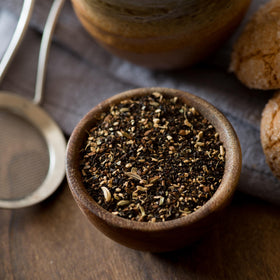 Frontier Co-op organic chai tea tin, showcasing traditional spice-forward flavor profile.