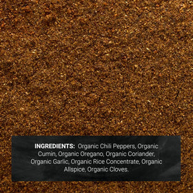 Pouring Frontier Co-op Organic Chili Powder Seasoning for quick taco night.