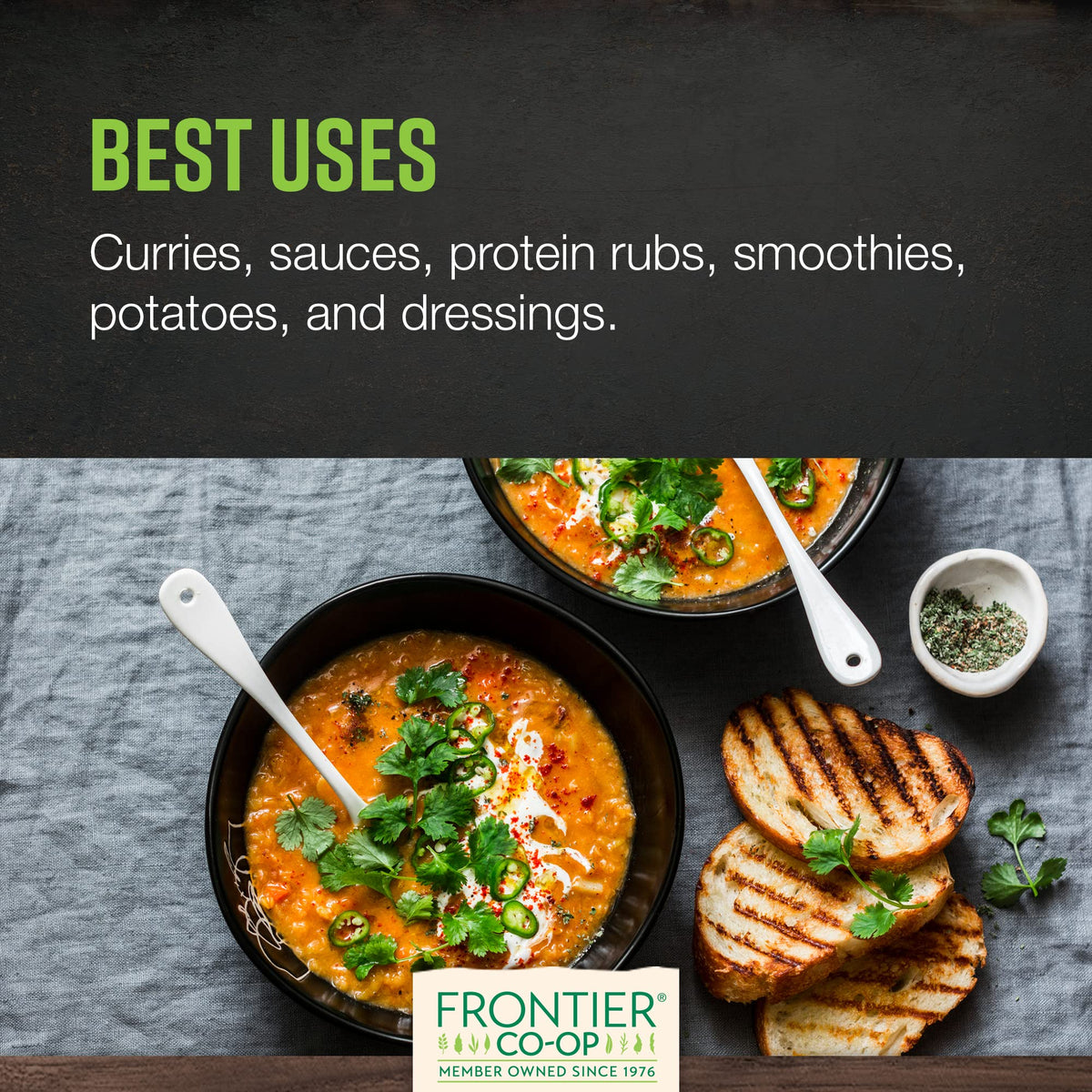 Frontier Co-op organic turmeric powder on a curry dish highlighting a rich golden hue.