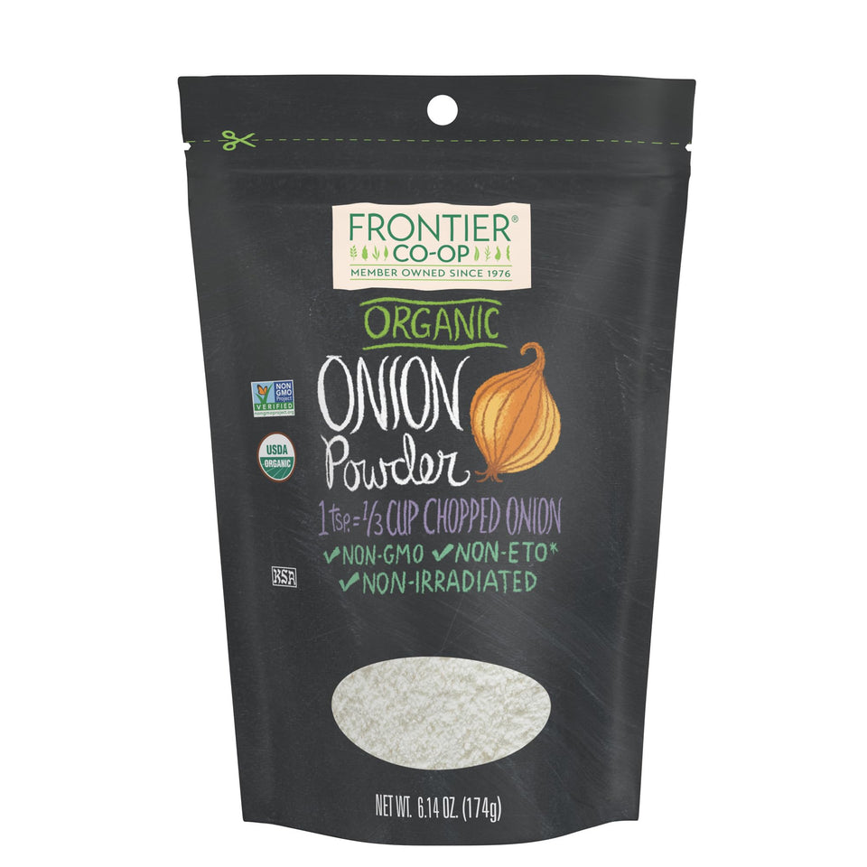 Frontier Co-op Organic White Onion Powder bottle on kitchen counter, ideal for sauces.