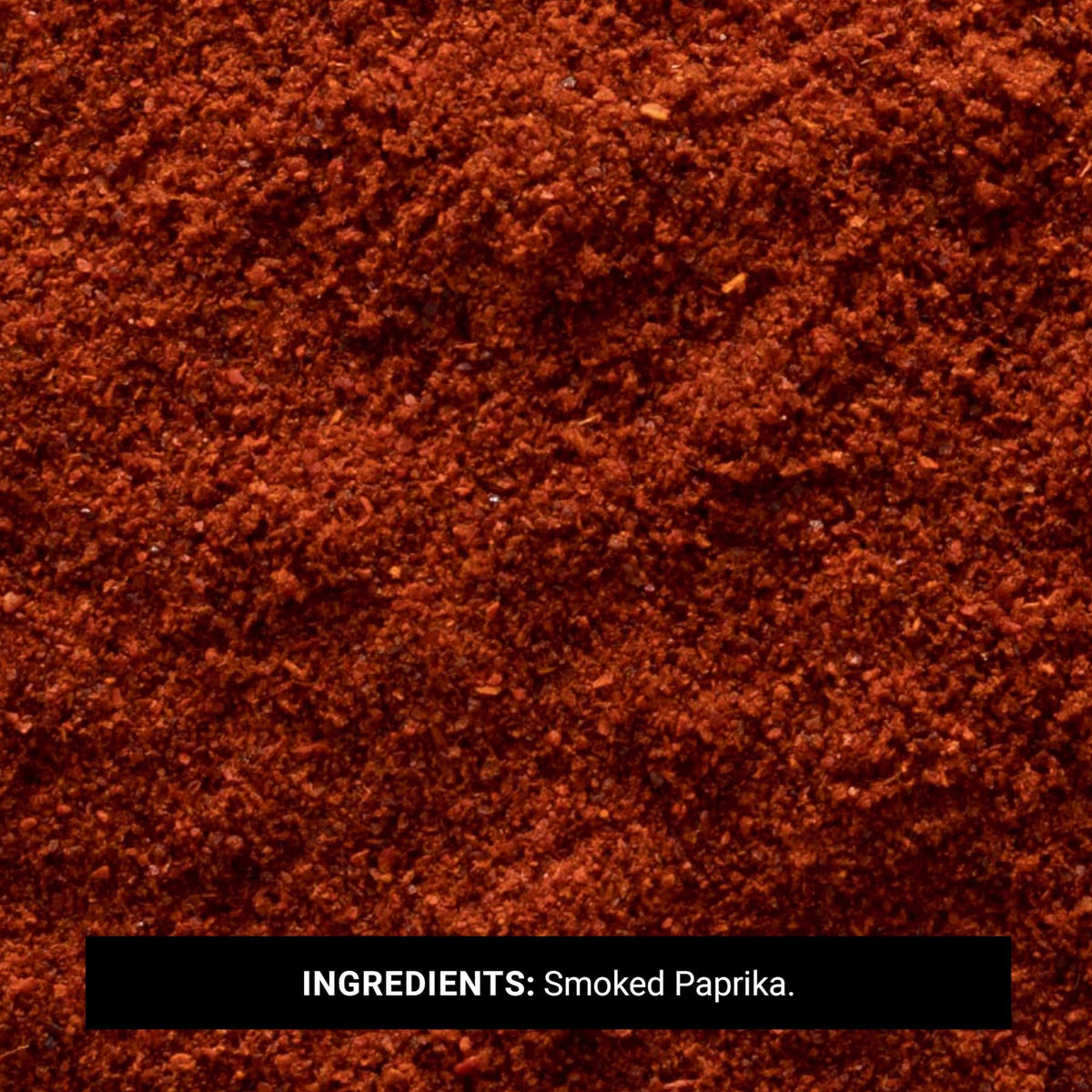 Frontier Co-op ground paprika jar closeup shows vibrant color.