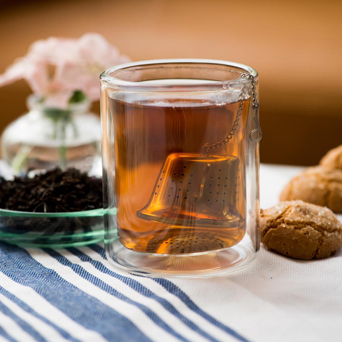 Steeped Frontier Co-op Ceylon tea with coppery red color and bold aroma.