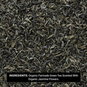 Frontier Co-op Jasmine Green Tea brewed in a cup, savoring fragrance.