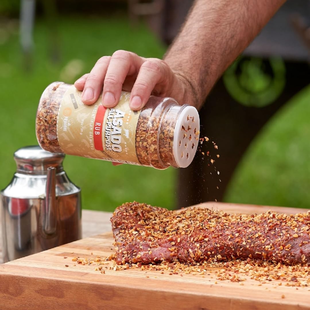 Frugoni Asado rub sprinkled on beef for enhanced grill flavor.