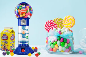 Fruidles bubble gum machine in a child's room for playful savings.