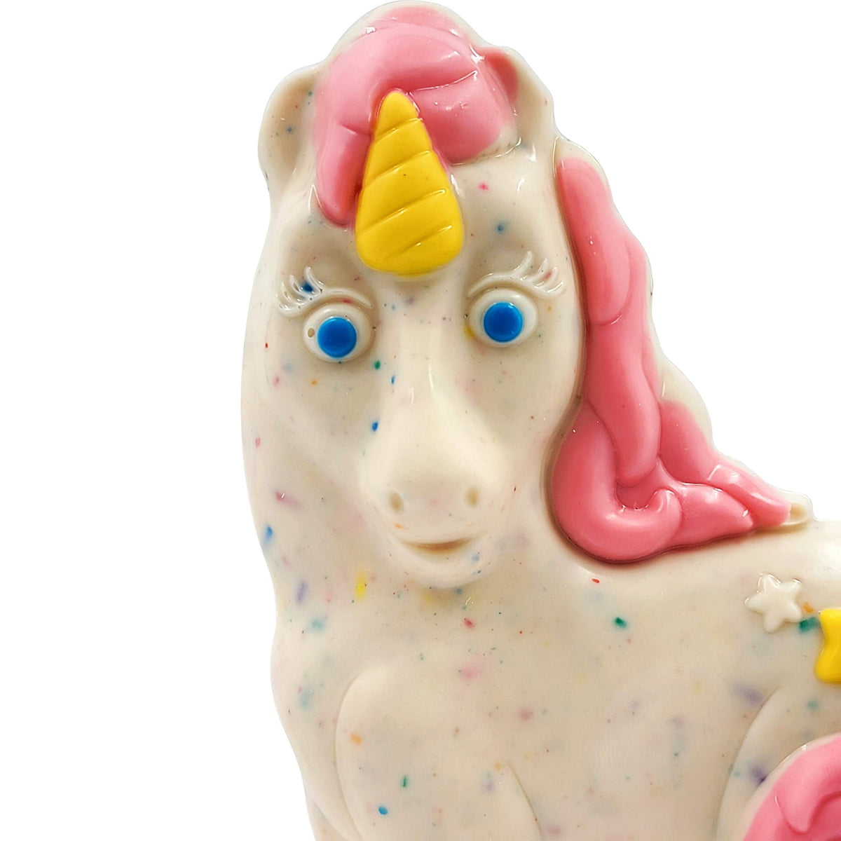 Fruidles hollow white milk chocolate unicorn with festive decorations.