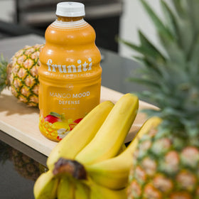 Fruniti ready-to-make smoothies in a tall glass, ready to enjoy.