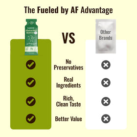 Hand holding Fueled by AF pistachio butter pouch for on-the-go snacking.