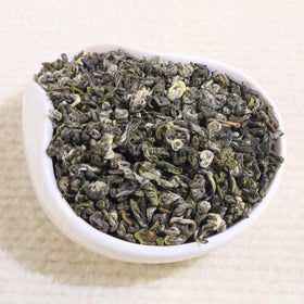 FullChea Bi Luo Chun steeping in teapot releases spring floral aroma.