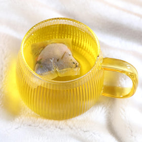 FullChea burdock root blend tea image suggests a refreshing moment