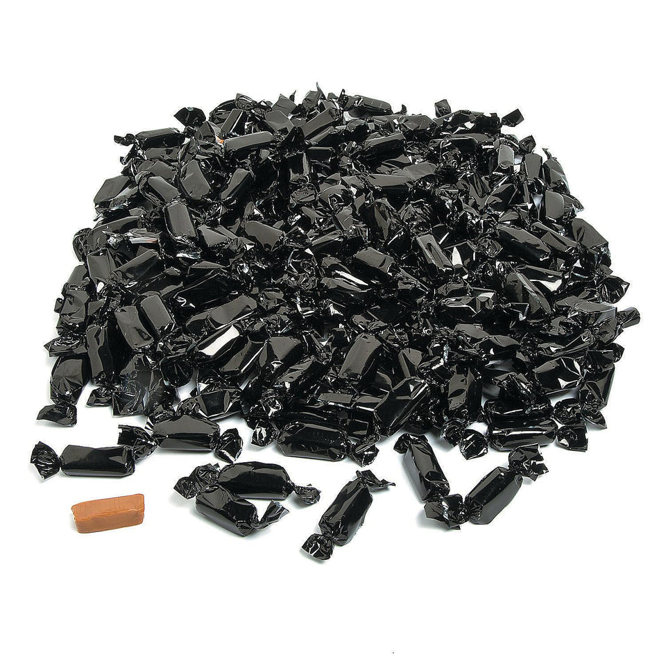 Fun Express black foil-wrapped caramels for elegant candy buffets.