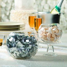 Wedding favors feature silver-wrapped mints that enhance bridal table displays.