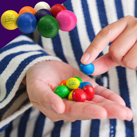 Fusion Sweets And Snacks in-store display with colorful gumballs attractively presented.
