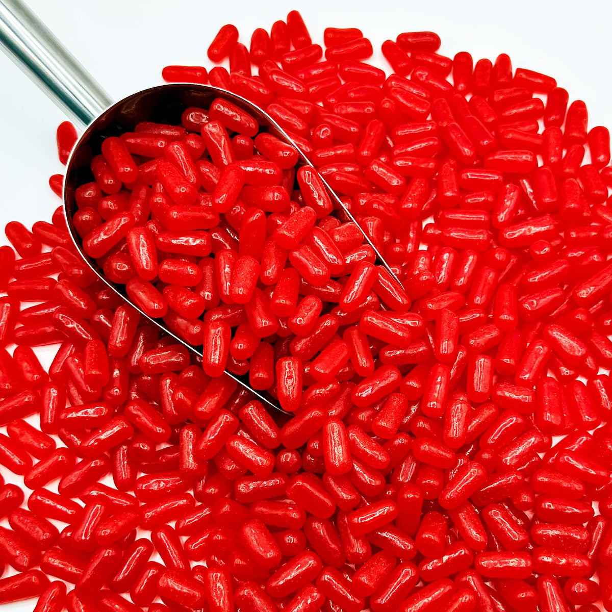 Fusion Sweets Hot Tamales Fierce bulk bag sits beside snacks at checkout.