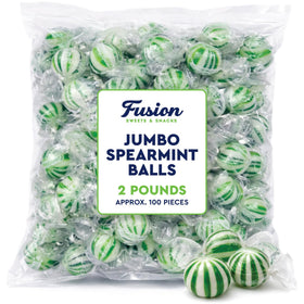 Fusion Sweets jumbo spearmint balls close-up reveals crisp texture and vibrant green-white color.