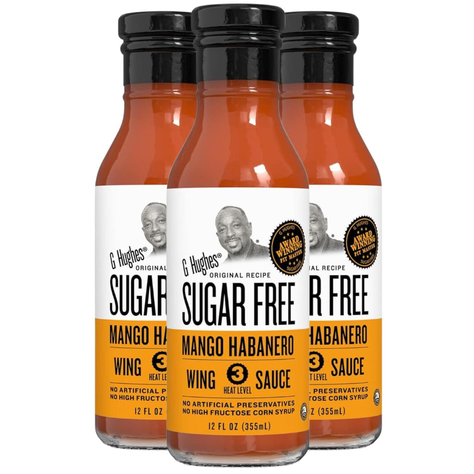 G Hughes Mango Habanero Wing Sauce bottle pour enhances wings with sugar-free heat.