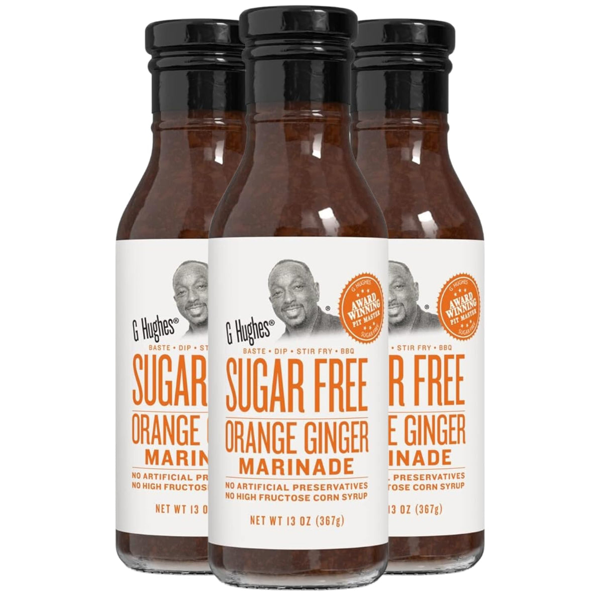 G Hughes Orange Ginger Marinade bottle adds bold, sugar-free flavor to grilled chicken.