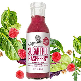 G Hughes Sugar Free Raspberry Vinaigrette dressing pour illustrate versatile use on greens