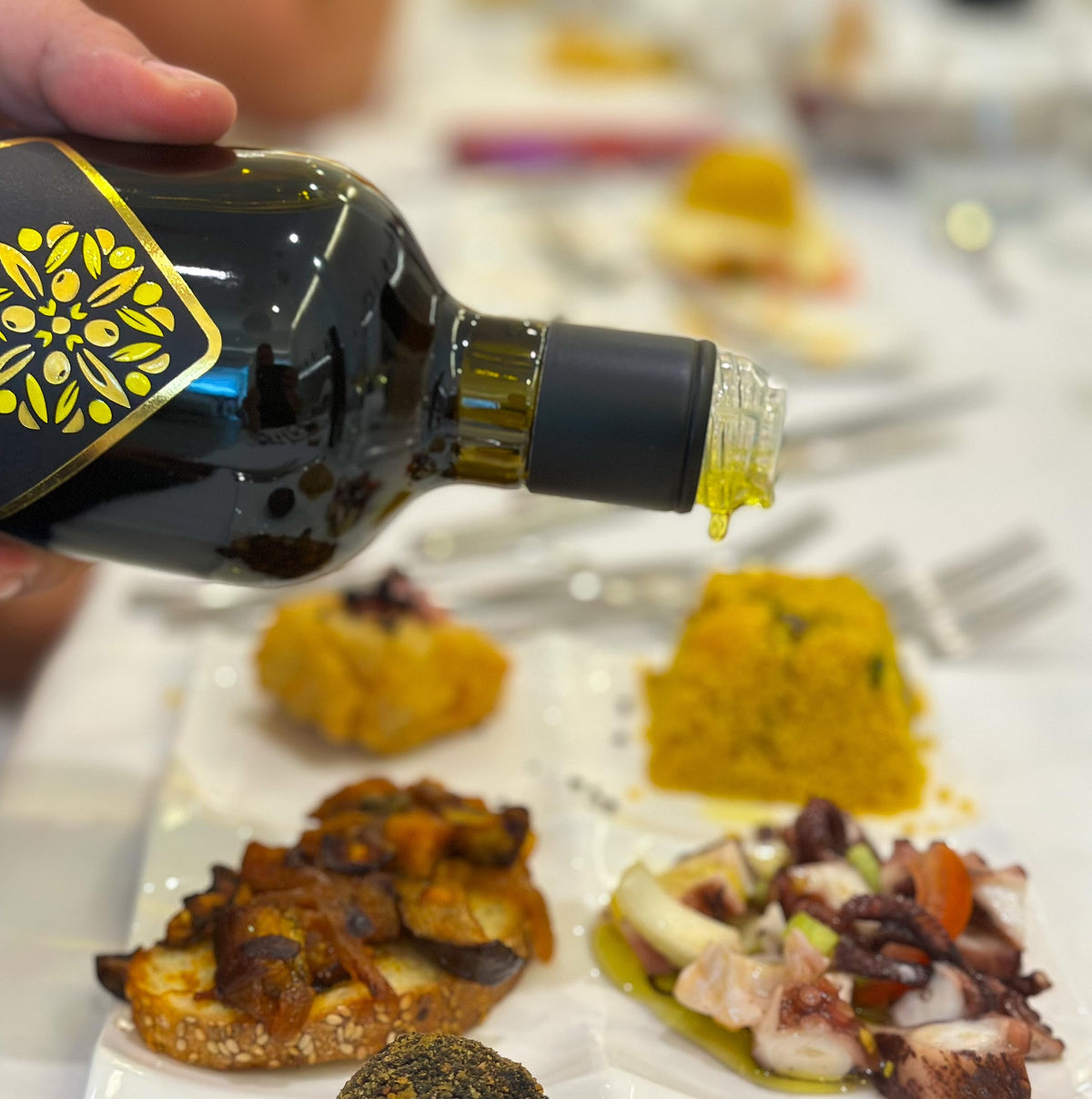 Galbasa Lemon Oil ingredients image highlighting lemons and olives for fresh flavor base.