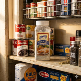 Galley Grove Pioneer Country Gravy Mix in a casserole-ready kitchen scene.