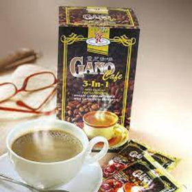 Ganocafe 3in1 dark roast sachet open revealing powder mix.