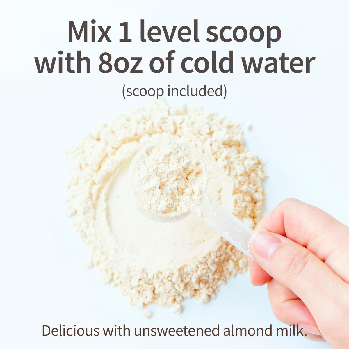 Garden of Life meal replacement shake daily use scenario with glass and spoon.