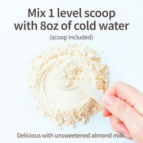 Garden of Life meal replacement shake daily use scenario with glass and spoon.