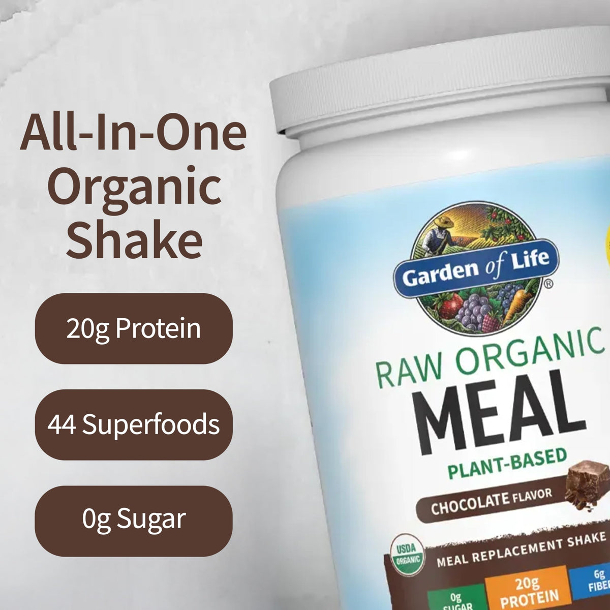 Garden of Life Meal Replacement Shakes chocolate scoop beside prepared serving.