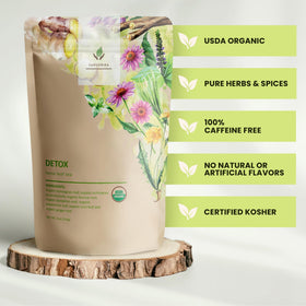 Gardenika loose-leaf tea being poured to reveal herbal blend