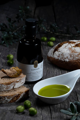 Garisar hand-picked Arbequina olives emphasize careful harvest and traceability.