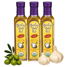Garlic Gold infused olive oil bottle pouring to boost garlic flavor in cooking