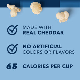 Close-up of Garrett Popcorn White Cheddar bags showing bold cheese flavor.