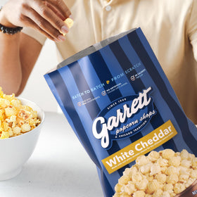 Garrett Popcorn White Cheddar served in a bowl during movie night.